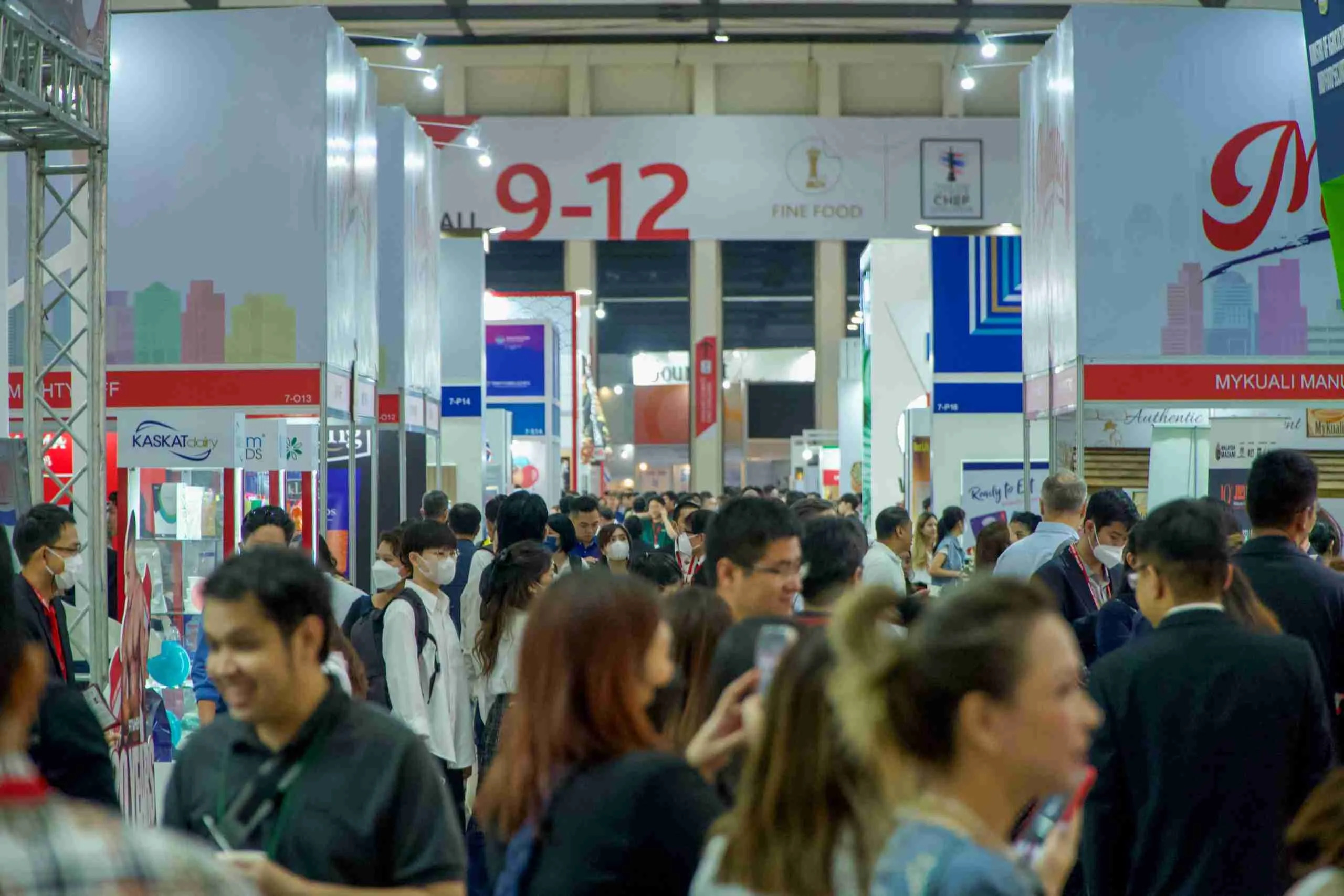 M-Pacific representatives networking with global partners at Thaifex 2025.